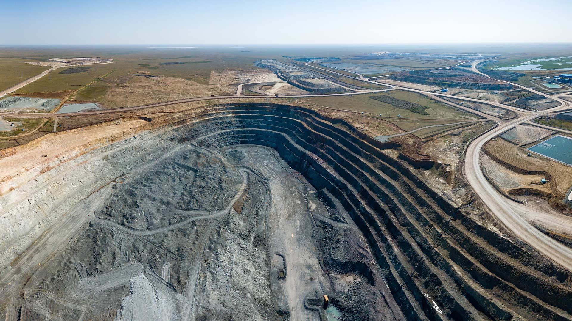Aerial drone style view of Bozshakol mining location, land, and surrounding areas. 