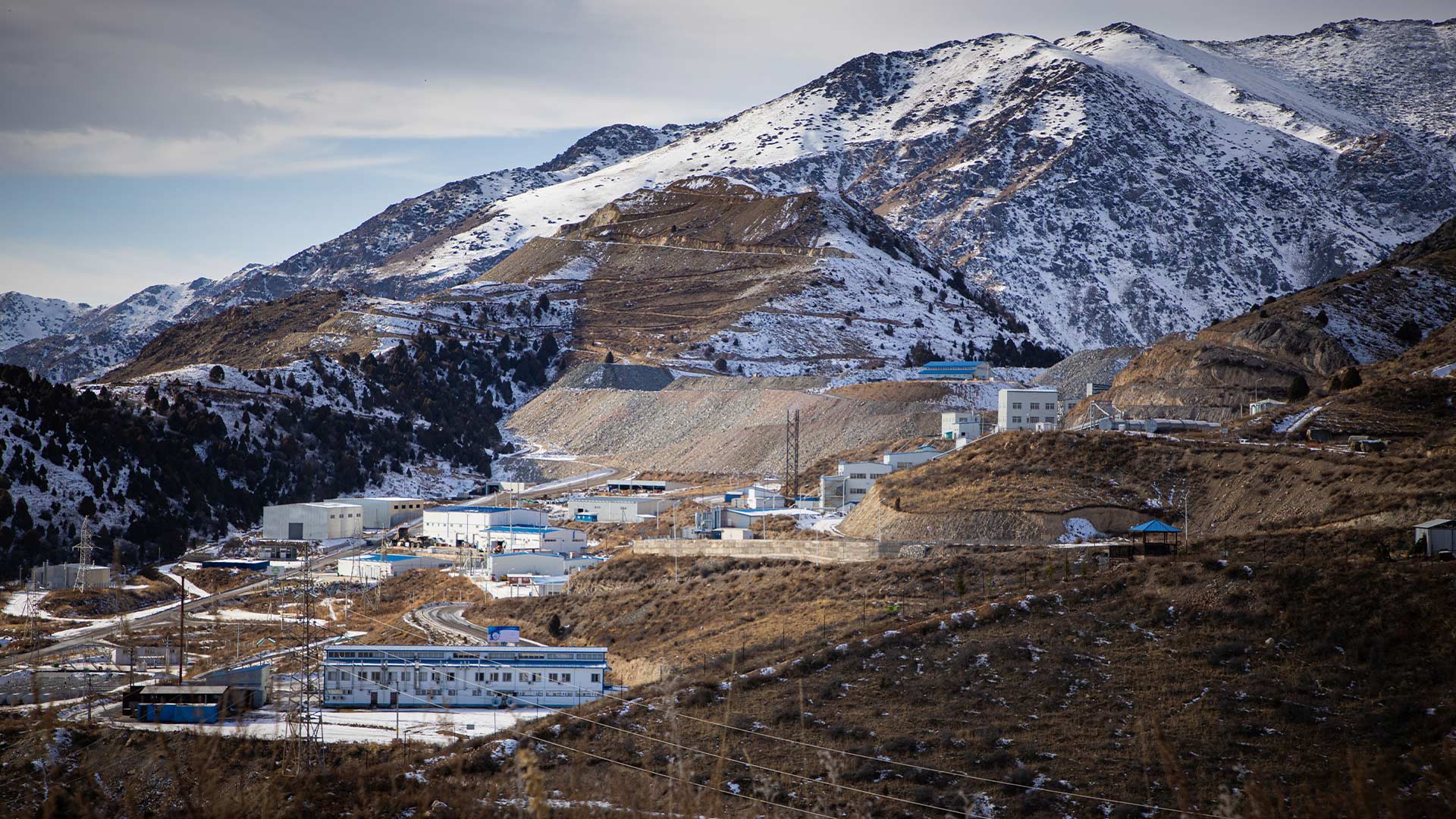 Distant shot of mountainous town. 
